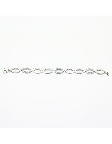 Pulsera de oro blanco de 18 Kts alternando eslabones lisos brillantes  con otros de circonitas 