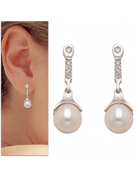 Pendientes colgantes en oro blanco y perla natural.